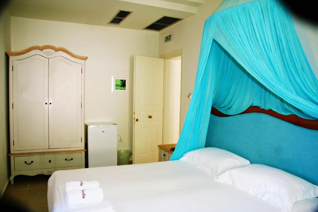 Alicelia Boutique Inn Вати Номер фото