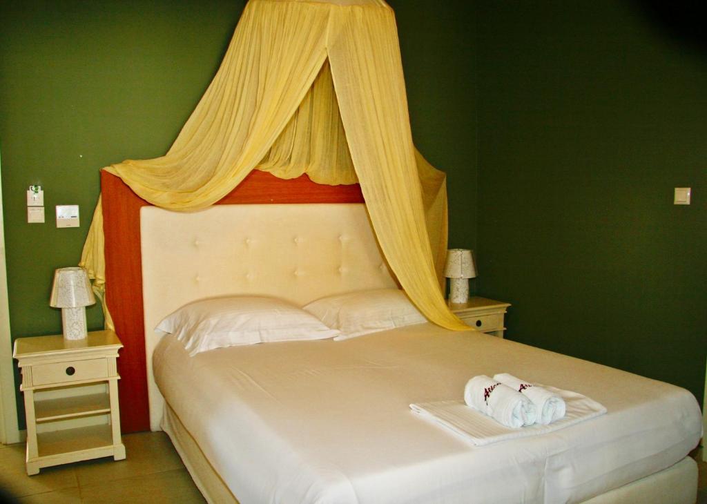 Alicelia Boutique Inn Вати Номер фото
